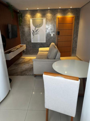Flat central com elevador e garagem